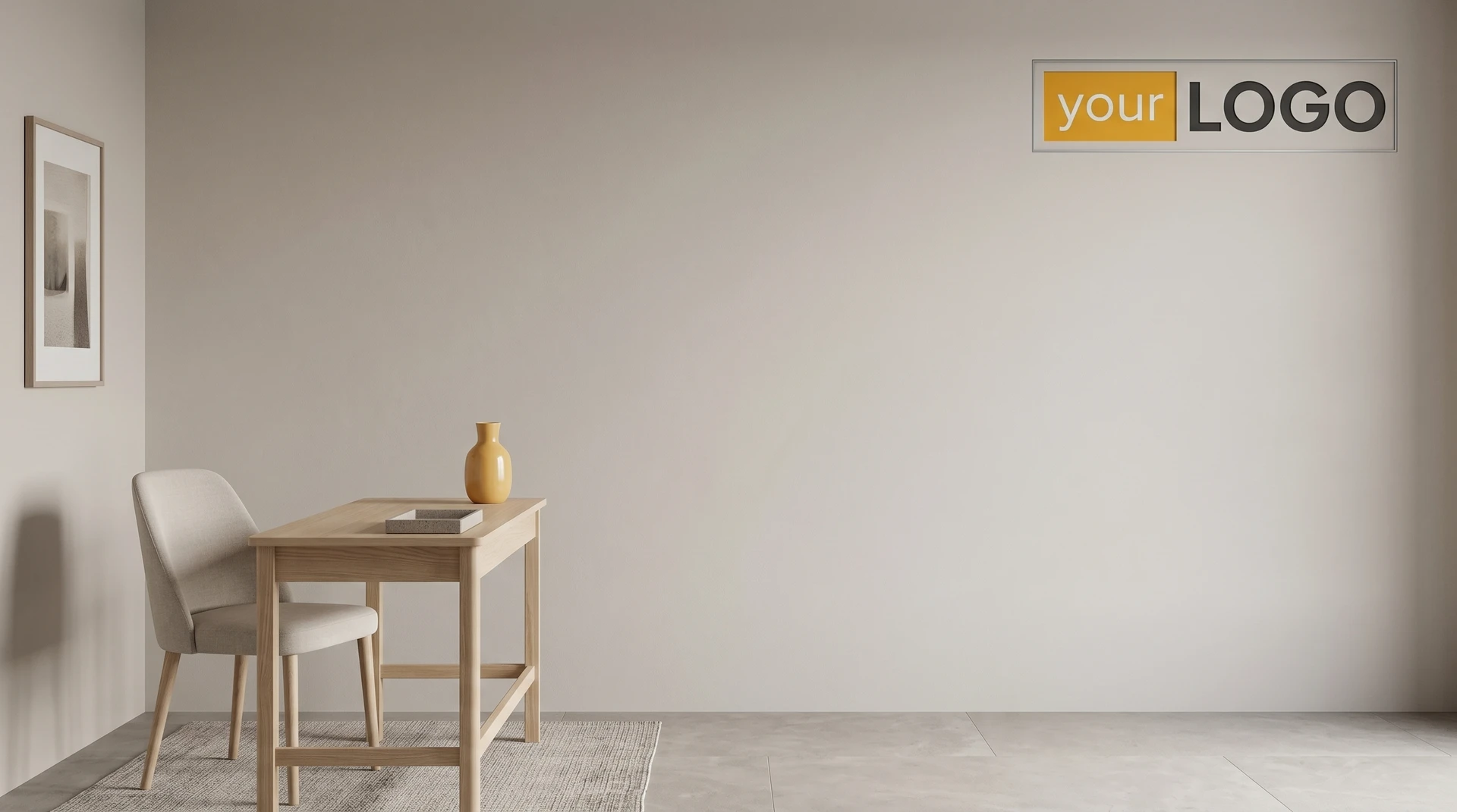 Minimal studio-style interior with light wood desk, upholstered chair, neutral wall, and framed logo creating a soft professional backdrop.
