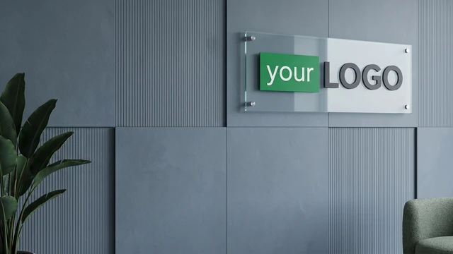 Blue textured wall panels with glass-mounted logo and plant creating a modern professional video call background.