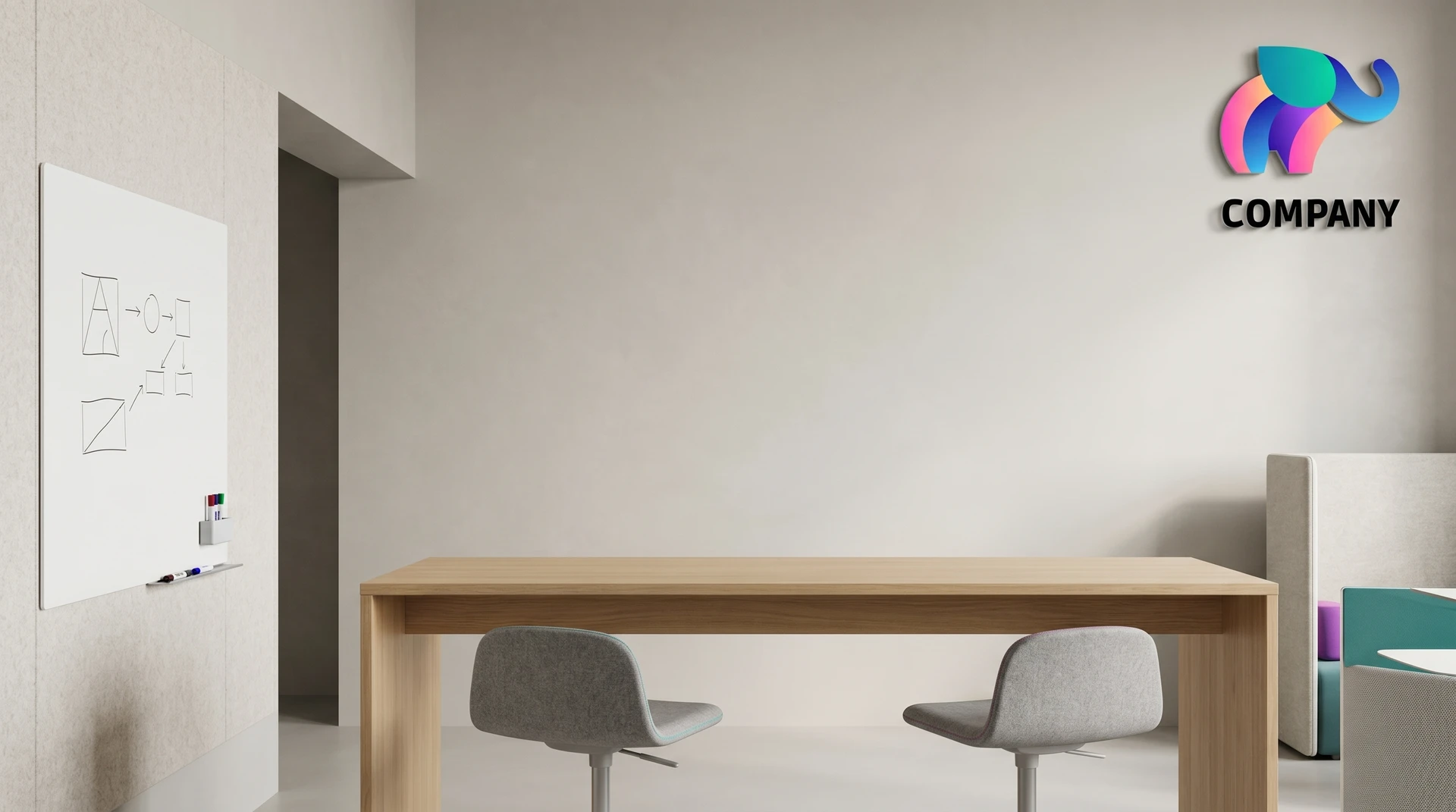 Minimal creative workspace with desk, chairs, whiteboard, and colorful logo creating a modern professional video call background.