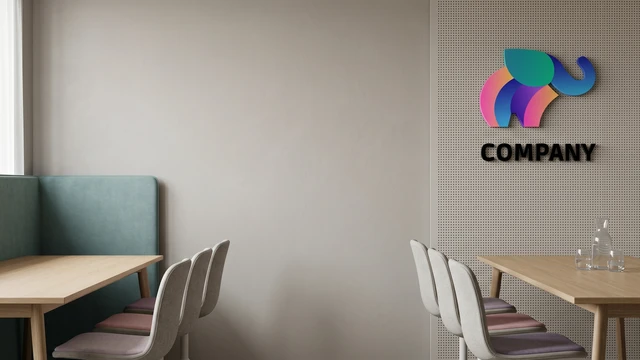 Modern meeting area with tables, chairs, booth seating, and colorful logo on wall creating a professional video call background.