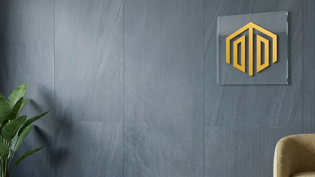 Dark textured wall panels with glass logo sign and plant detail, designed for modern professional video calls and virtual meeting backgrounds.