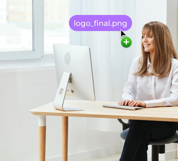 Woman using a desktop computer